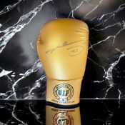 Evander Holyfield signed gold VIP boxing glove. Evander Holyfield (born October 19, 1962) is an