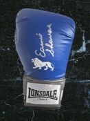 Earnie Shavers signed blue Lonsdale boxing glove. Good condition. All autographs come with a