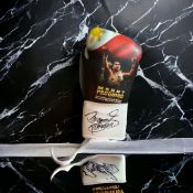 Manny Pacquiao signed personalised boxing glove. Good condition. All autographs come with a