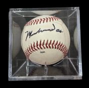 Muhammad Ali signed baseball in display case. January 17, 1942 - June 3, 2016) was an American