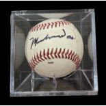 Muhammad Ali signed baseball in display case. January 17, 1942 - June 3, 2016) was an American