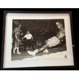 Michael Watson signed 21x17 inch overall framed and mounted black and white photo. Pictured during