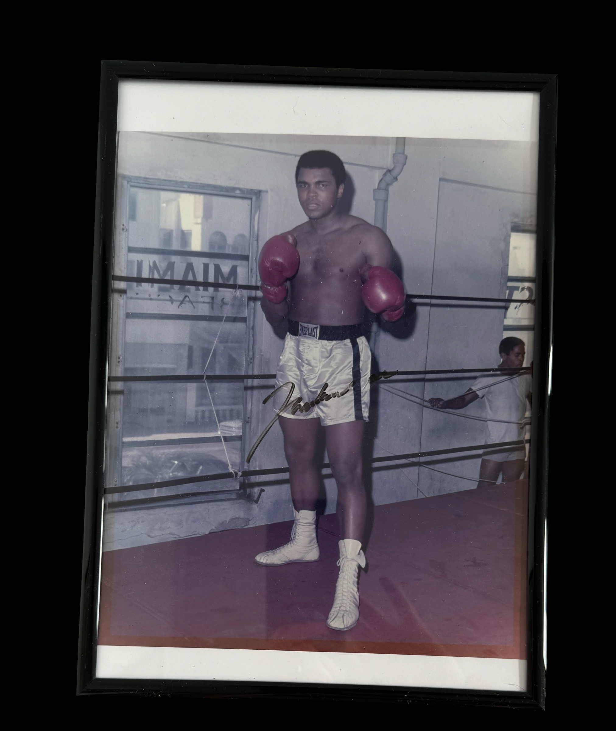 Muhammad Ali signed colour photo. Framed to approx size 12x8inch. Good condition. All autographs