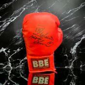 Frank Bruno signed red Britannia boxing glove. Franklin Roy Bruno, MBE (born 16 November 1961) is