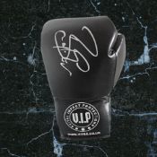 Barry McGuigan signed black VIP boxing glove. Finbar Patrick McGuigan MBE (born 28 February 1961) is
