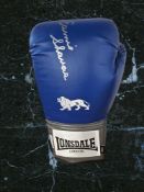 Earnie Shavers signed blue Lonsdale boxing glove. Good condition. All autographs come with a