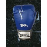 Earnie Shavers signed blue Lonsdale boxing glove. Good condition. All autographs come with a