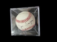 Joe Frazier signed baseball in display case. (January 12, 1944 - November 7, 2011), nicknamed