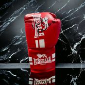 Evander Holyfield signed red Lonsdale boxing glove. Evander Holyfield (born October 19, 1962) is