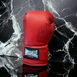 Larry Holmes signed red Lonsdale boxing glove signature a little faded. Larry Holmes (born