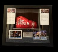 Tyson Fury and Deontay Wilder signed red Lonsdale glove in 20x24x5 inch box display. Good condition.