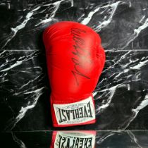 Vitali Klitschko signed red Everlast boxing glove. As a boxer, Klitschko won multiple world