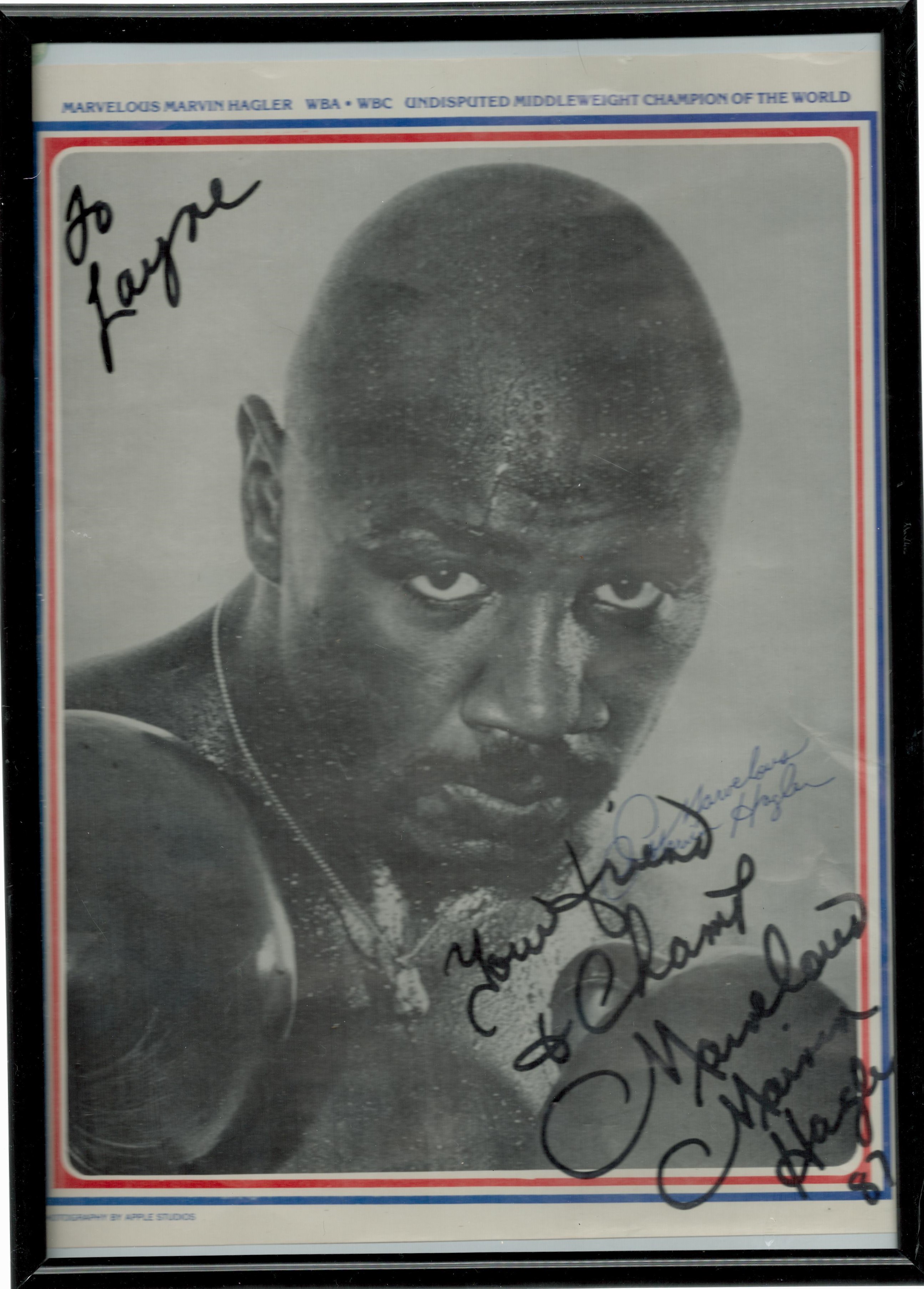 Marvellous Marvin Hagler signed black and white magazine photo. Framed to approx size 12x8inch. Good