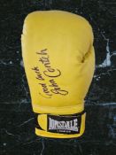 John Conteh signed yellow Lonsdale boxing glove. John Anthony Conteh, MBE (born 27 May 1951) is a