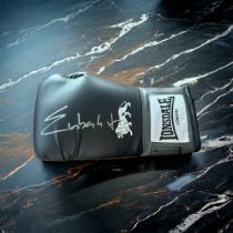 Chris Eubank signed black Lonsdale 16oz boxing glove. Christopher Livingstone Eubank (born 8