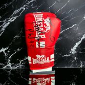 Lennox Lewis and Evander Holyfield signed red Lonsdale boxing glove. Good condition. All