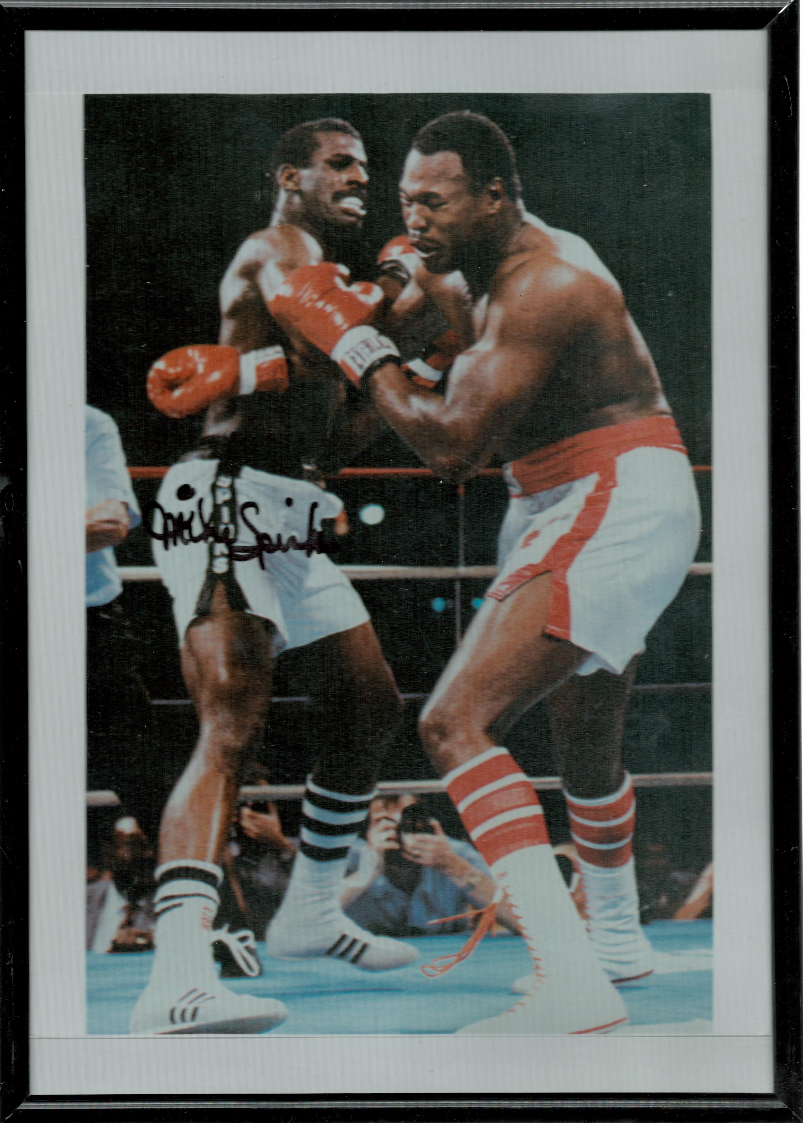 Michael Spinks signed colour photo. Framed to approx size 12x8inch. Good condition. All autographs