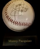 Manny Pacquiao signed baseball in display case. December 17, 1978) is a Filipino politician and