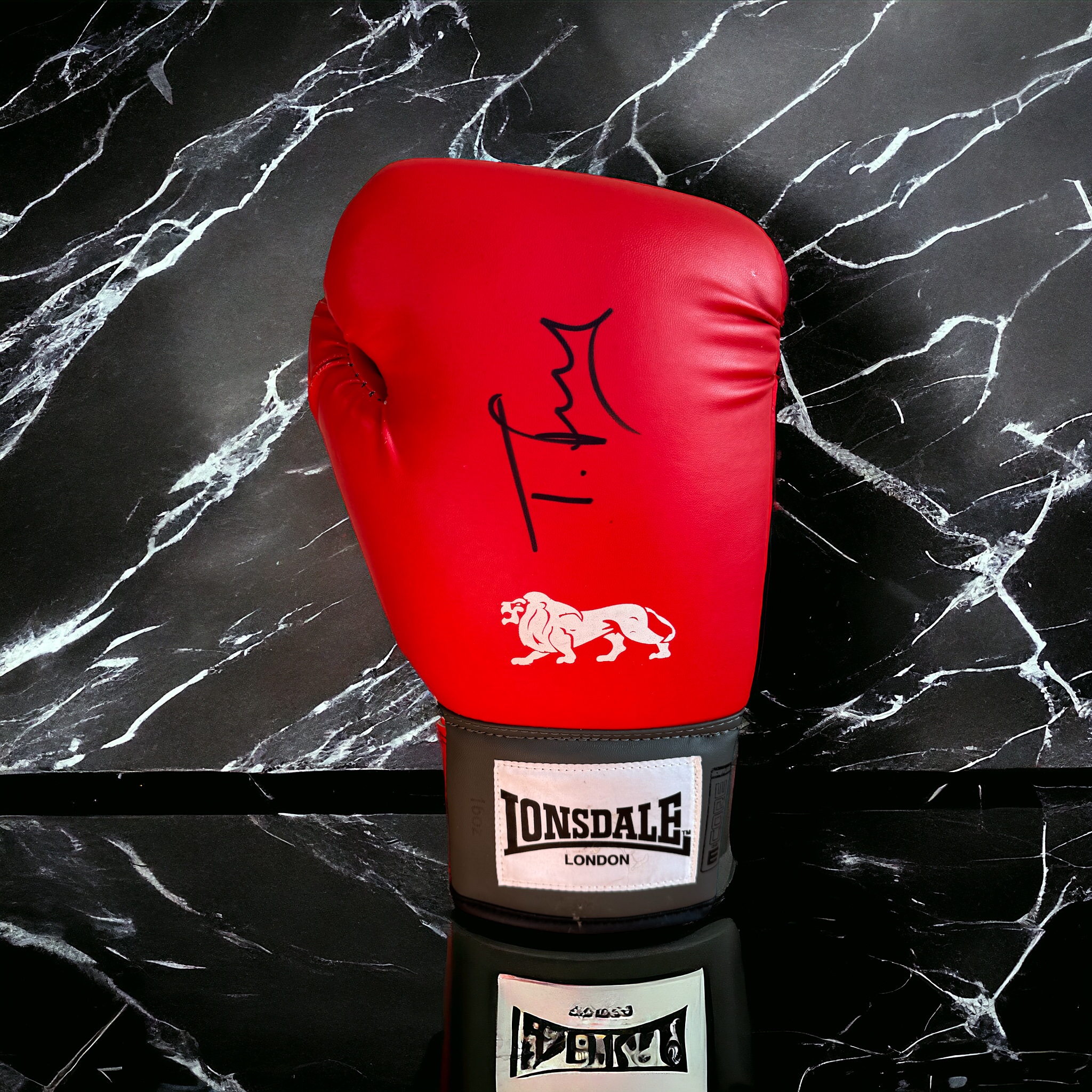 Tyson Fury signed red Lonsdale boxing glove. Good condition. All autographs come with a