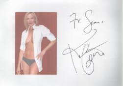 Kim Cattrall signature piece with colour photo. Dedicated. Measures 12"x82 appx. Good condition. All