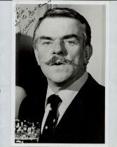 Windsor Davies signed 10x8 inch black and white photo dedicated. Good condition. All autographs come