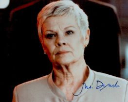 Judi Dench signed 10x8 inch colour photo. Good condition. All autographs come with a Certificate