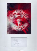 Martin Buchan framed signature piece with Manchester United photo logo. Measures 12"x16" appx.