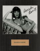 Amanda Barrie signed 14x12 inch overall mounted black and white photo. Good condition. All