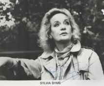 Sylvia Syms signed 10x8 inch black and white photo. Good condition. All autographs come with a