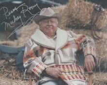Mickey Rooney signed 10x8 inch colour photo. Good condition. All autographs come with a