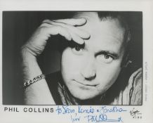 Phil Collins signed 10x8 inch black and white promo photo dedicated. Good condition. All