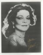 Lauren Bacall signed black and white photo. Measures 8"x10" appx. Good condition. All autographs