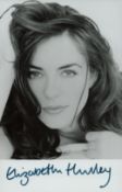 Elizabeth Hurley signed 6x4 inch black and white photo. Good condition. All autographs come with a