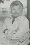 Benny Hill signed 6x4 inch black and white promo photo dedicated. Good condition. All autographs
