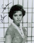 Sophia Loren signed 10x8inch black and white photo. Good condition. All autographs come with a