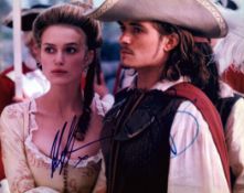 Keira Knightly and Orlando Bloom signed Pirates of the Caribbean 10x8 inch colour photo. Good