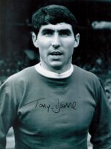 Tony Dunne Signed 16 x 12 Black and White Photo. Good Condition. All autographs come with a