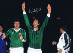 Autographed NORMAN WHITESIDE 16 x 12 Photo : Col, depicting NORMAN WHITESIDE celebrating in front of