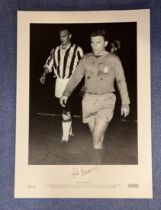 John Charles signed 16 x 23 black and white limited-edition photo. Photo shows Charles leaving the