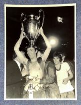 David Sadler signed 16 x 12 black and white photo. Photo shows Sadler holding aloft a trophy on