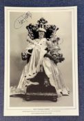 Football. Charlie George Signed 18x12 black and white photo. Photo shows George posing as a KING