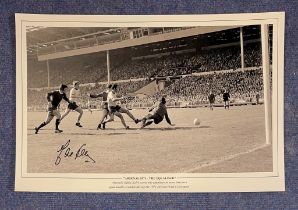 Eddie Kelly Arsenal signed 18 x 12 black and white print. Print shows Kelly scoring the equaliser in
