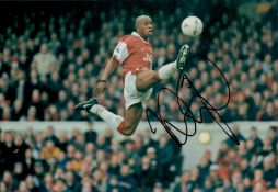 Ian Wright signed 12x8 inch colour photo pictured while playing for Arsenal. Good Condition. All