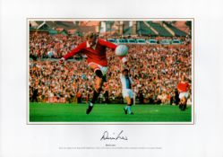 Denis Law 16 x 12 Signed Coloured Photo. Photo shows Denis Law as the King Of Old Trafford from 1962