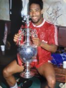 John Barnes signed 16x12" colour photo pictured celebrating with the league championship trophy