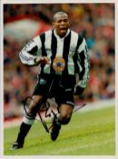 Faustino Asprilla signed 10x8 inch colour photo pictured in action for Newcastle United. Good