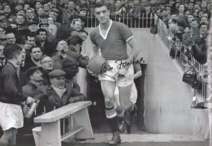 Football. Bill Foulkes Signed 18x12 black and white photo. Photo shows Foulkes running from the