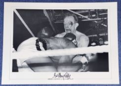 Sir Henry Cooper Signed 14 x 19 Black and White Photo. Photo shows Henry Cooper and Cassius Clay