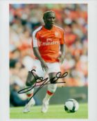 Bacary Sagna signed 10x8 inch colour photo pictured in action for Arsenal. Good Condition. All