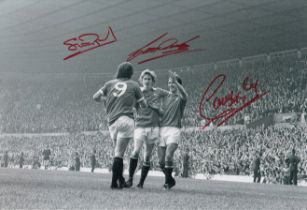 Autographed MAN UNITED 12 x 8 Photo : B/W, depicting Man United's STUART PEARSON celebrating with